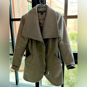Asymmetrical zipper, tulip hem, wool coat. Perfect for office/casual occasion